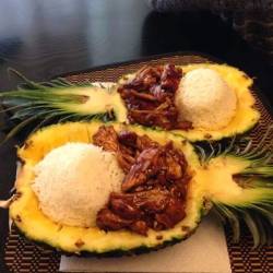 everybody-loves-to-eat:  Teriyaki chicken and steamed rice in a pineapple bowl. 