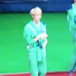 jnumyeon-deactivated20140929:  sehun holding and smelling zitao’s hoodie ヽ(*≧ω≦)ﾉ
