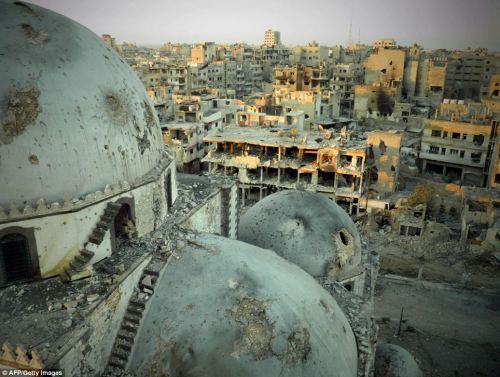 unnamedline:  The wasteland: Horrifying aerial pictures show full scale of destruction of Syrian city of HomsRead more: http://www.dailymail.co.uk/news/article-2380913/Homs-aerials-scale-destruction.html#ixzz2aUqDuBix Follow us: @MailOnline on Twitter | D