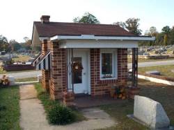 sixpenceee:  The Dollhouse Grave of Nadine Earles  At just 4 years old, Nadine passed away shortly before Christmas in 1933. According to locals, Nadine wanted a dollhouse for Christmas that year. As a way of giving her the dollhouse she never got, the