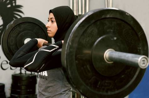 iron-truths:  Reclaiming Fitspo - Amna Al Haddad  DUBAI, United Arab Emirates — In a private gym tucked away in the warren of villas in the ritzy Jumeirah district here, Amna Al Haddad, a 22-year-old, adjusted her head scarf, bent to a dumbbell rack