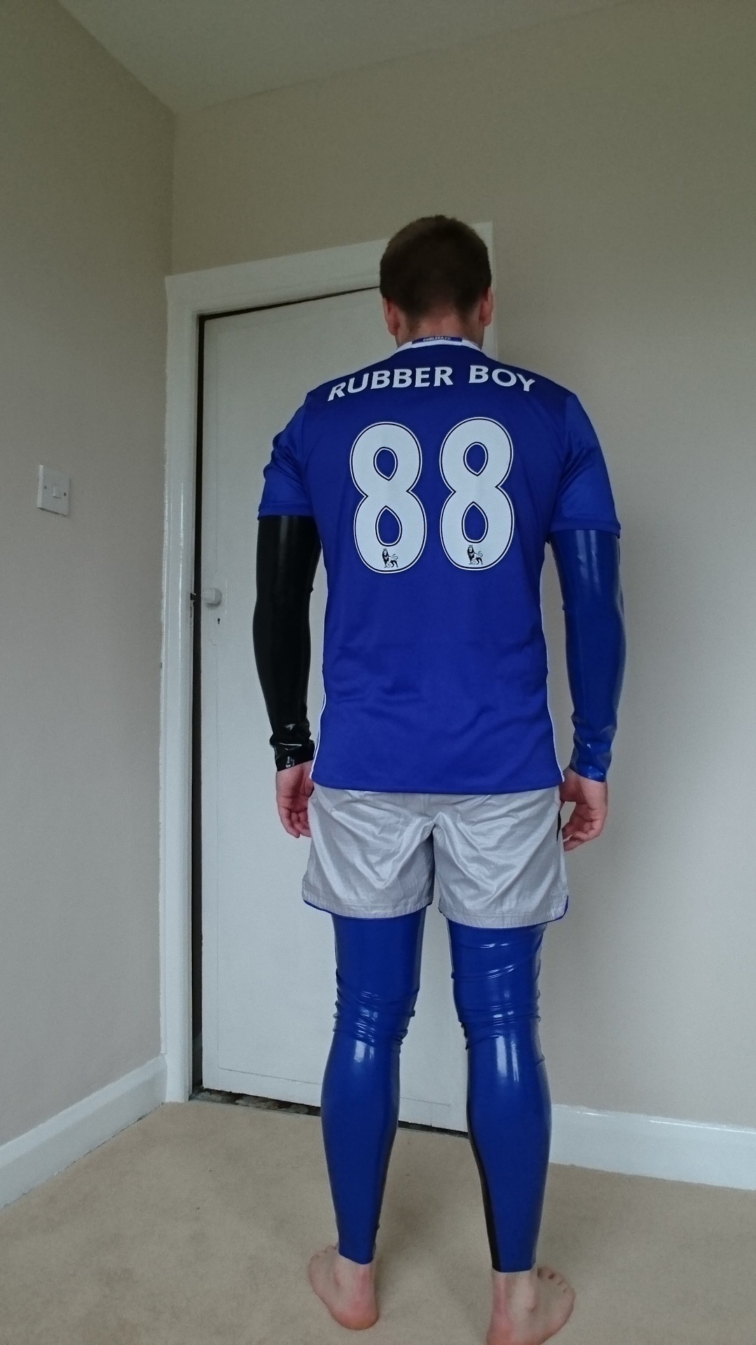 rubberboy-sheeman:  Full rubber suit and Chelsea kit… Been on since 2:30pm UK time