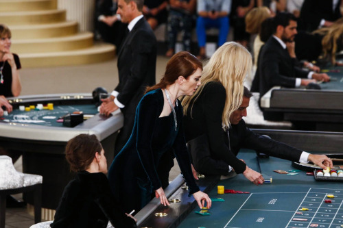 mariah-do-not-care-y:  Julianne Moore, Kristen Stewart, Lara Stone, Jamie Bochert, Lily Collins, Lily-Rose Depp, Rinko Kikuchi, Rita Ora, Stella Tennant playing poker and roulette at Chanel Couture Fall 2015