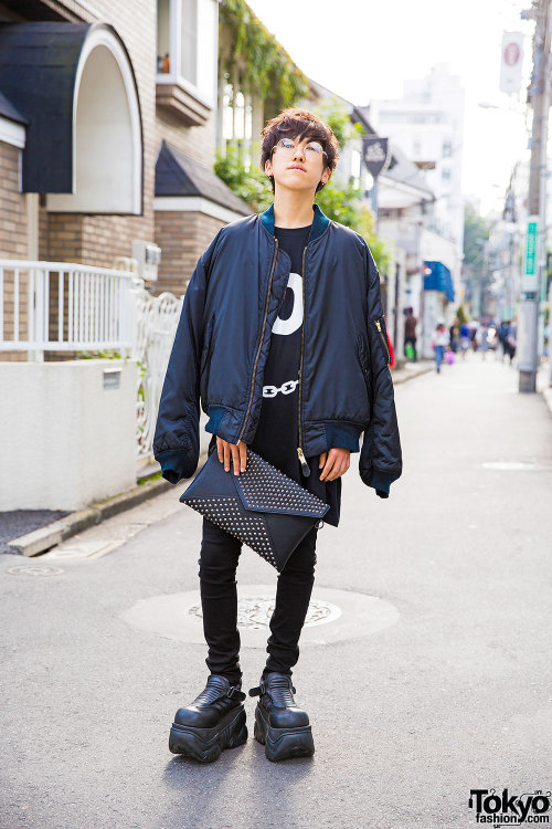 17-year-old Yuto on the street in Harajuku wearing a draped bomber jacket from Elcasion with a Long 