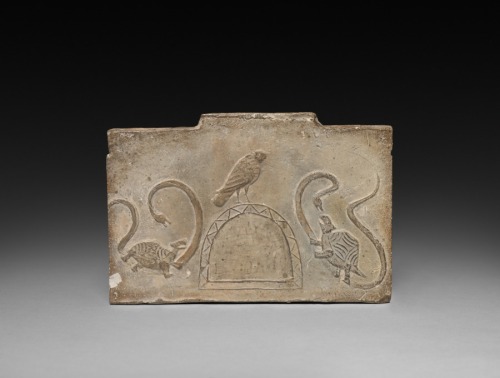 Panel from Model Cooking Stove: Raven Flanked by Snake-Entwined Tortoises, 1st Century BC, Cleveland
