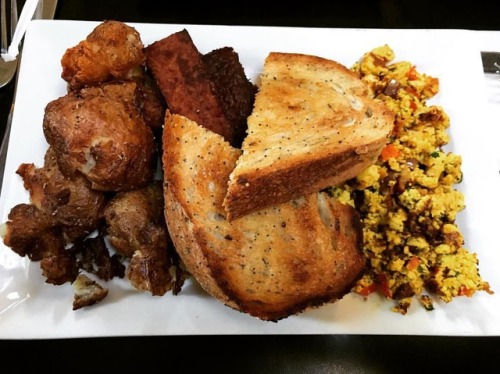 Vegan breakfast at a restaurant?…….. YES PLEASE!Potatoes, tempeh bacon, tofu scrambl
