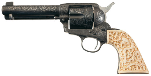 Engraved and gold inlaid Colt Model 1873 Single Action Army with carved ivory grips, circa 1901.