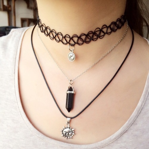 TheMoonCult has this wonderful sun child necklace set in stock right now! This necklace set has cute