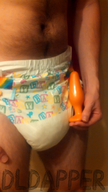 dldapper:  Aw, little baby is embarrassed to show his toy. Such a cutie!Baby wanted to make stickies and I let him, but under the condition that he had to be grinding against his bum bum toy and no touching was allowed. I figure it’s a win-win, he gets