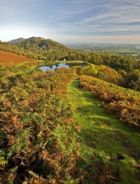 Grassy path leading down the hills to the reservoir, Malvern Hills / England (by flash of light).