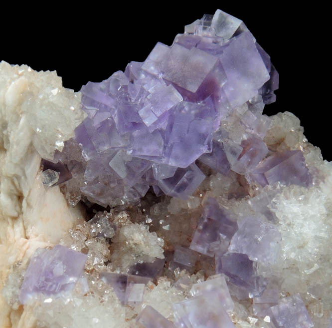 vugnasmineralblog:    Fluorite on Quartz with BariteCaravia-Berbes District, Asturias,
