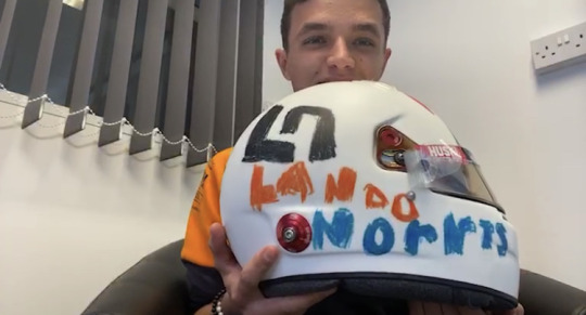 loving-ricciardo:Lando’s Silverstone helmet designed by a fan ❤️💙