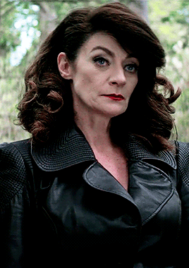 lilith-adam-wardwell:Lilith in black leather coat  (。･ω･｡)ﾉ♡ || Caos 1x07 - Feast of the Feasts