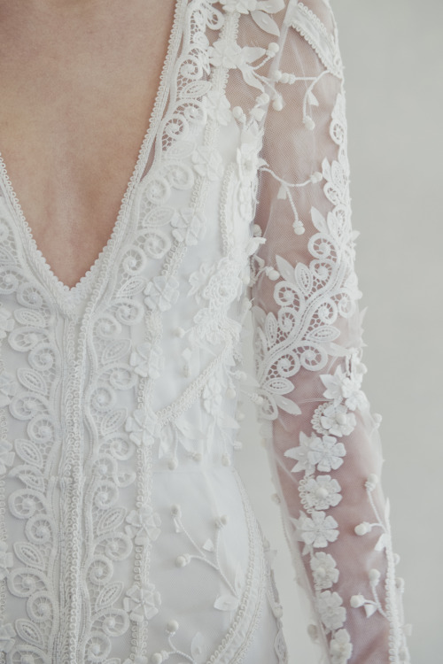 Four different kinds of lace cut into individual motifs and highlighted with a mixture of beading an