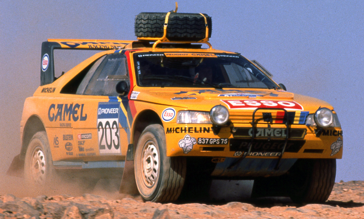 carsthatnevermadeit:  What a difference 27 years makes top Peugeot 405 T16 Dakar,