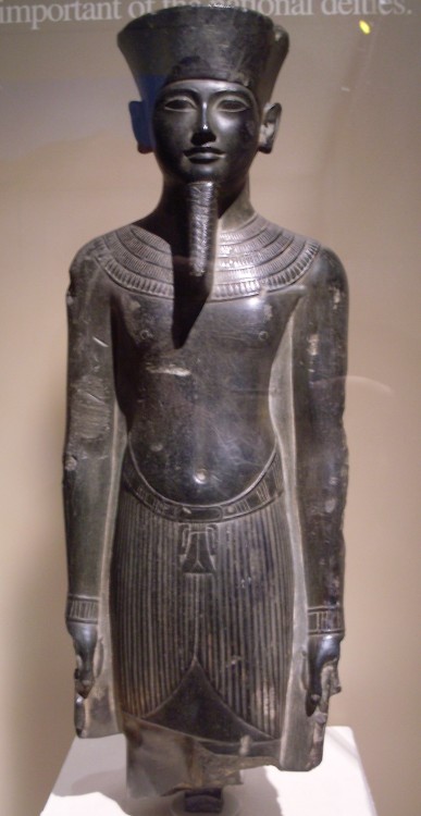 Statue of Amun, patron deity of Egyptian Thebes.  Artist unknown; ca. 2000 BCE (11th Dynasty, Middle