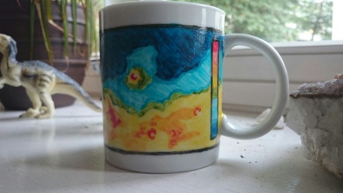 magnetospheric:I painted a mug based on the MOLA topographic map of Mars. It was so much fun! The bo