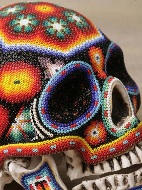 Day of the Dead skulls, decorated by the indigenous Huichol/Wixáritari people of Mexico.