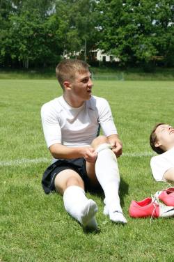 Men in rugby and footy socks