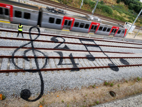 itscolossal: Colorful Street Art on the Train Tracks of Portugal by Artur Bordalo