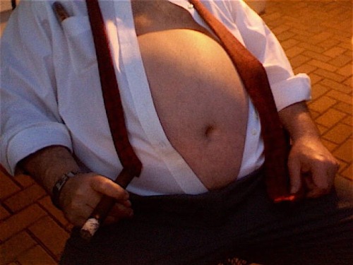 thatonebigcub: tankertubbs: I love this guys combo of suit, cigar belly and bear :P Who is he? cant 