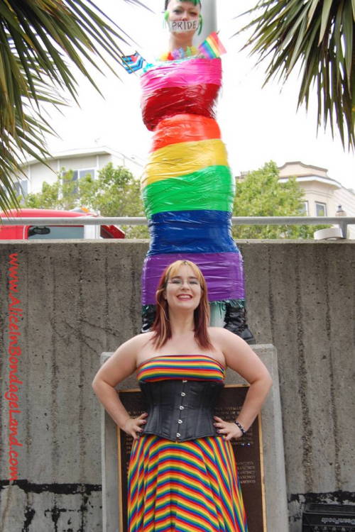 mistressaliceinbondageland:  Finished pride flag project with Denali Winter - hundreds of people in downtown San Francisco, California saw our public bondage performance art this year. See the video at http://www.aliceinbondageland.com - we’re putting