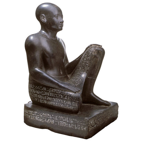 Seated statue of vizier HorThis vizier is shown seated with one leg bent up against his chest and th