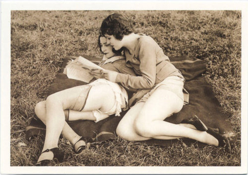  A blanket, a book, and thou. 1920s. Photographer: Unknown 