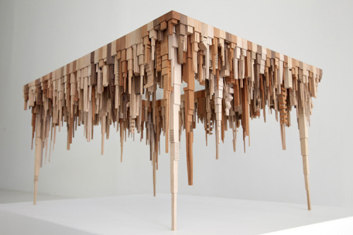 archiemcphee:  Philadelphia-based artist James McNabb transforms scraps of wood into awesome assemblages of architectural shapes, dazzling cityscapes made of repurposed wood that sometimes resemble tables and wheels. McNabb describes his unique form of