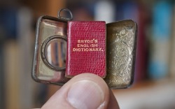 capricedubibliophile:  fuckyeahbookarts: The Smallest English Dictionary in the World has been discovered by West Country book shop owner Graham York. Although only 1x3/4inch the tiny book’s 384 pages contain thousands of words, and even comes with