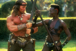 weirdlandtv:Publicity photos of Arnold Schwarzenegger and Grace Jones for CONAN THE DESTROYER (1984).