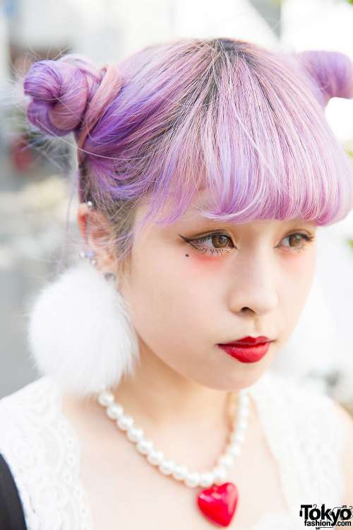 18-year-old fashion school student Serina on the street in Harajuku with lilac hair, a lace crop top