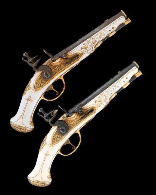 A pair of ivory stocked, gilt flintlock pistols made for King Louis XVI circa 1770.from Holt’s Aucti