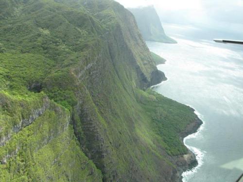 Cliffs of MolokaiThis photo captures perhaps the largest sea cliff on Earth, the north shore of the 