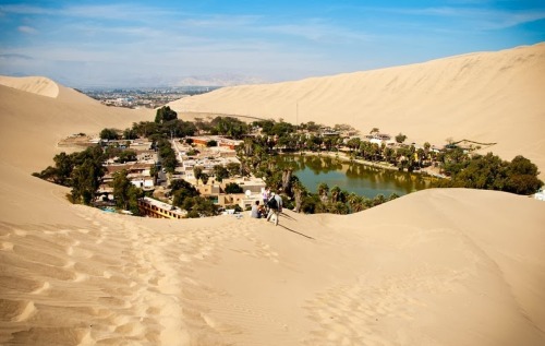 sixpenceee: Huacachina is a tiny town in southern Peru, an hour away from the Pacific coast. Th