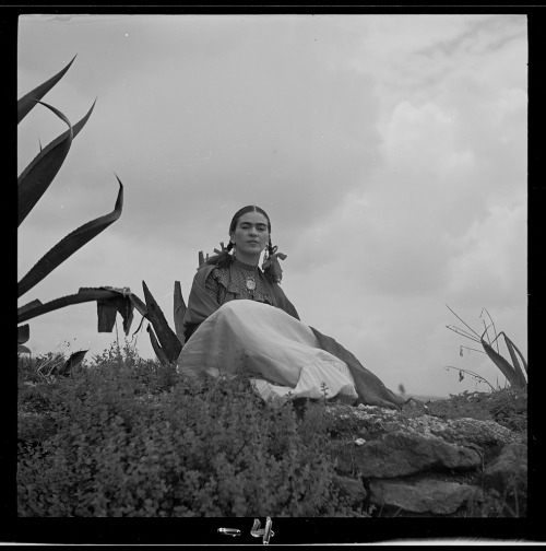 coolchicksfromhistory: Frida Kahlo seated next to an agave plant during a photo shoot for Vogue maga