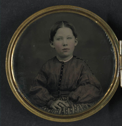  Unidentified girl seated in dress, ca. 1865