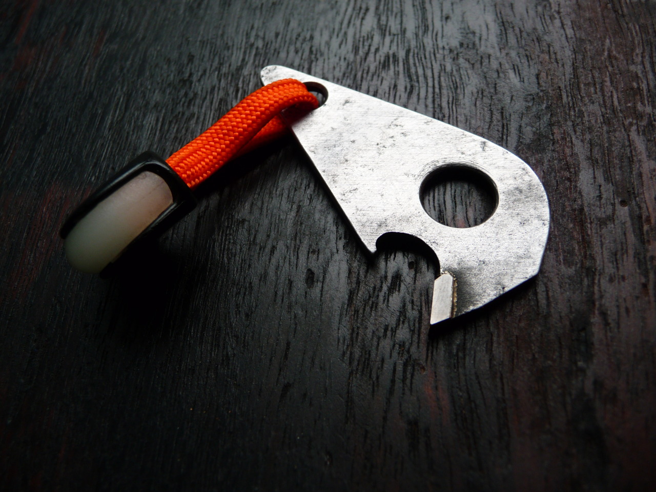 everyday-cutlery:  ru-titley-knives:  Off cut tungsten bottle opener. When the saw