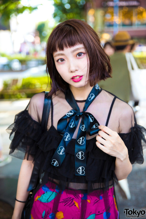 Japanese electrical engineer Lana on the street in Harajuku wearing a sheer ruffle top from Oh Pearl
