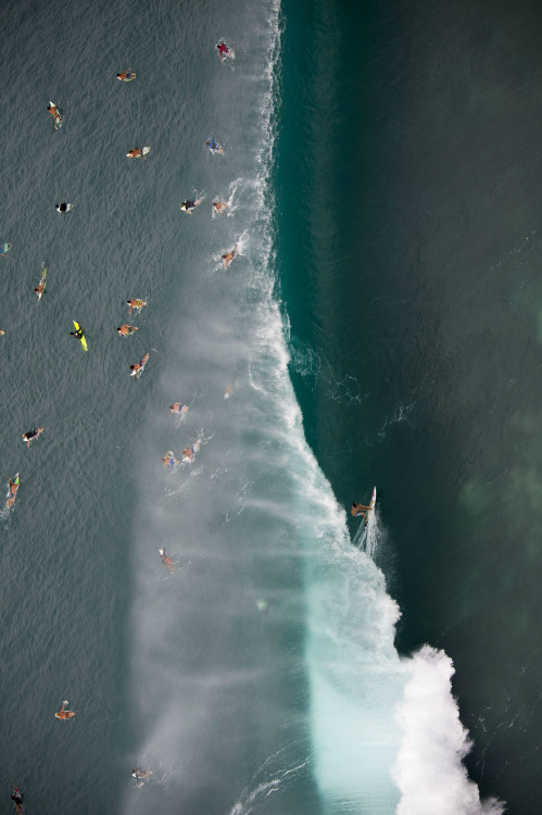highenoughtoseethesea:  Reef, charging Pipe.  Shot from the heli by Ryan Miller 