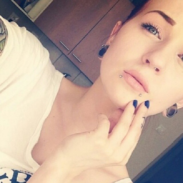 screamsmonica:  #plugs #snakebites #tattoos 