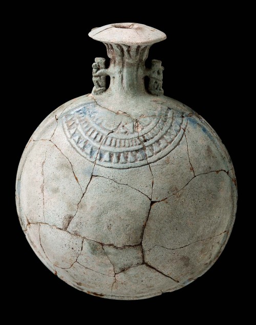 ancientpeoples:  New Year’s FlaskLate Period Egypt, Dynasty 26, ca. 664–525 B.C.Found at Tell el-Yahudiya (Leontopolis) in 1905-6; excavated by W. M. F. Petrie for the Egyptian Research Account and presented to the MFA.This small (12.5 cm x 9.5 cm)