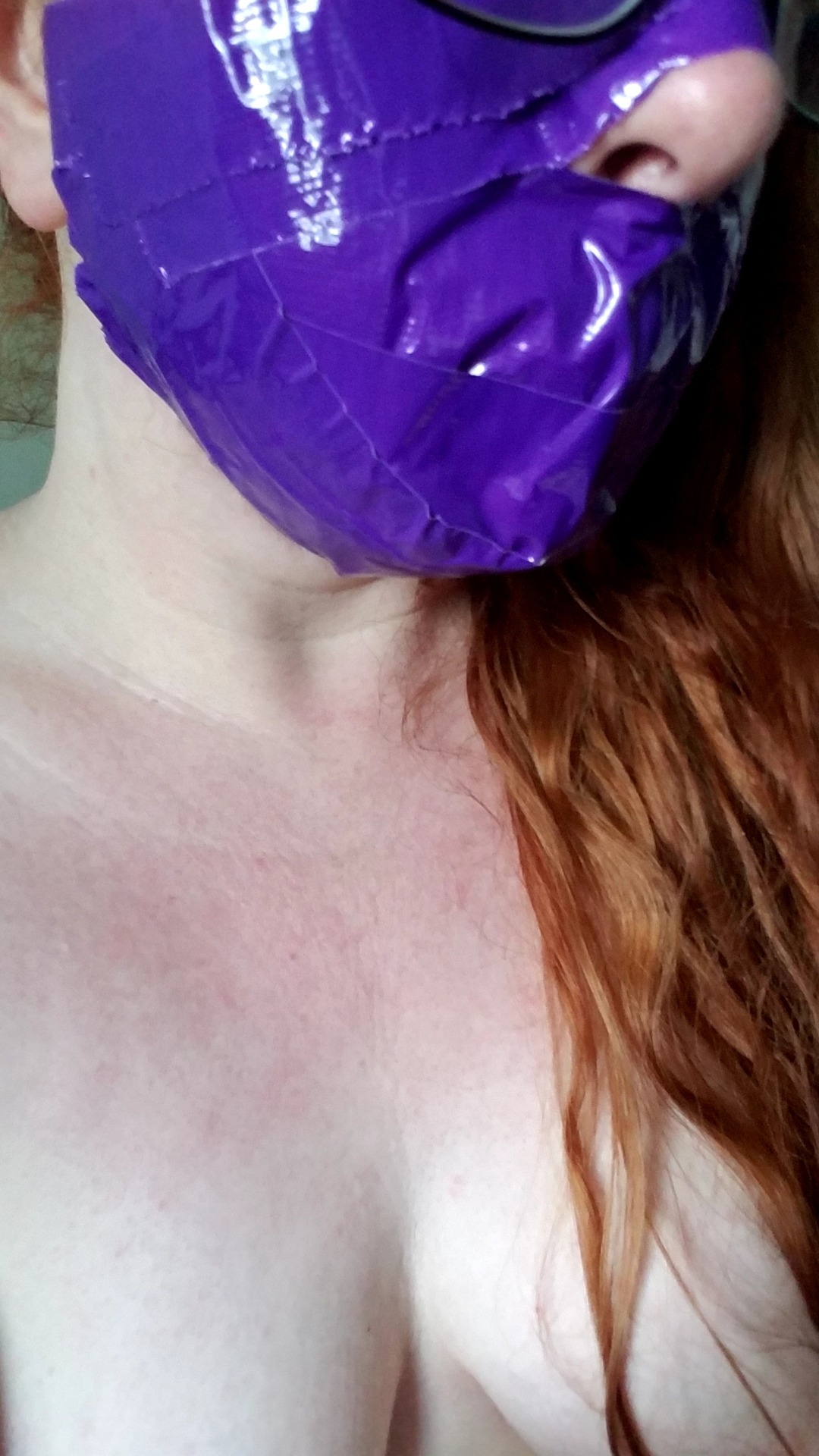 manic-pixie-ginger-slut:  Thoroughly silenced with a tape muzzle. Haven’t woen