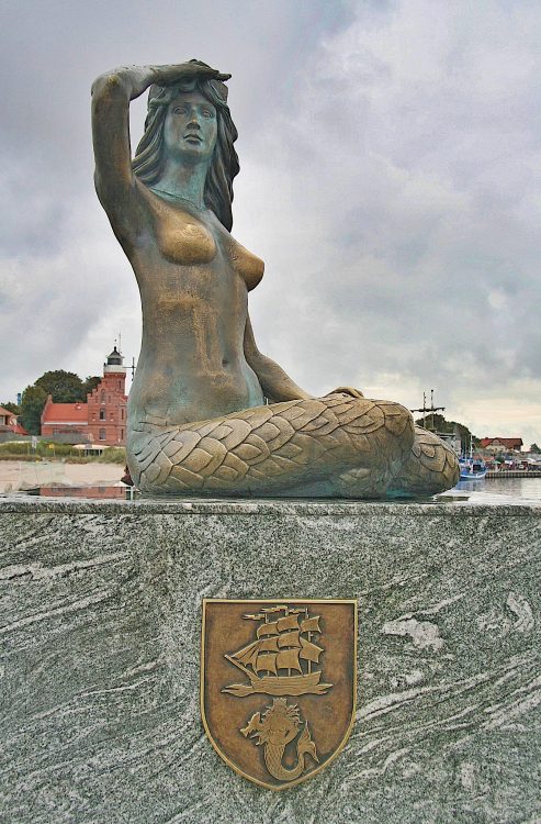 mermaidenmystic:The Ustka Mermaid in Ustka Harbor, Poland“This statue of the mermaid was created in 