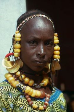 iseo58:  Portrait of a Fulani woman with traditional golden earrings and headdress, region near the Mali, Senegal border, Mihael Renaudeau 