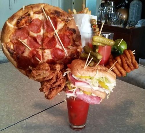 pauljay:  randyliedtke:  Relaxing with a Bloody Mary Recipe: Ice, Bloody Mary Mix, Vodka, Footlong Sub, 4 Piece Fried Chicken, Peperoni Pizza, 2 Double Cheese Burgers, Another Bloody Mary, Onion Rings, Fries, Garlic Bread, Pickles, Olives, Onion, Lemon,