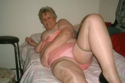What a sexy older lady in pink lingerie. These hefty and mature