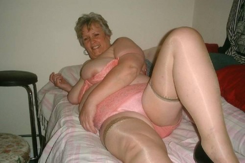 XXX What a sexy older lady in pink lingerie. photo