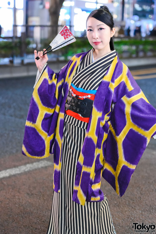 Maho and Tomomitsu - both traditional Japanese performance artists - on the street in Harajuku weari