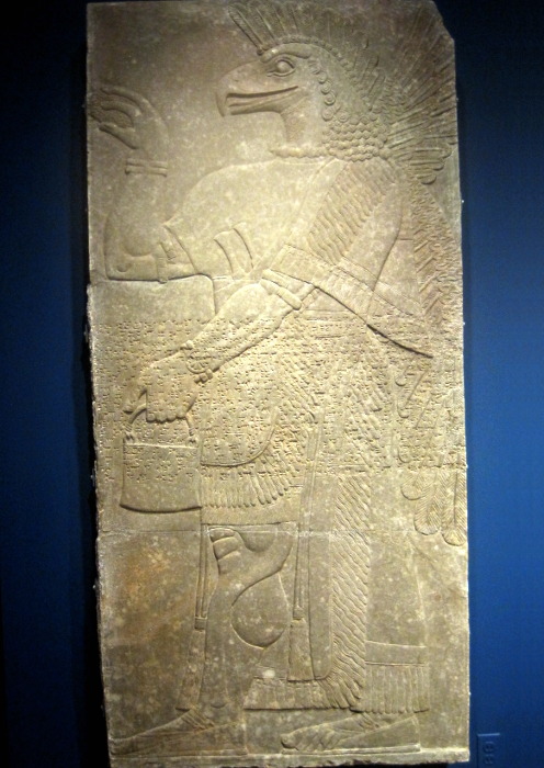 Winged eagle-headed guardian spirit from the Northwest Palace of the Assyrian king Ashurnasirpal II,